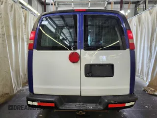 2013 Chevrolet Express Cargo Van with VIN 1GCWGFCA0D1162305, listed as a IAAI auction lot 42197453 with 284,943 mi miles. Bid and sale history available at carsss.com. Image 7.