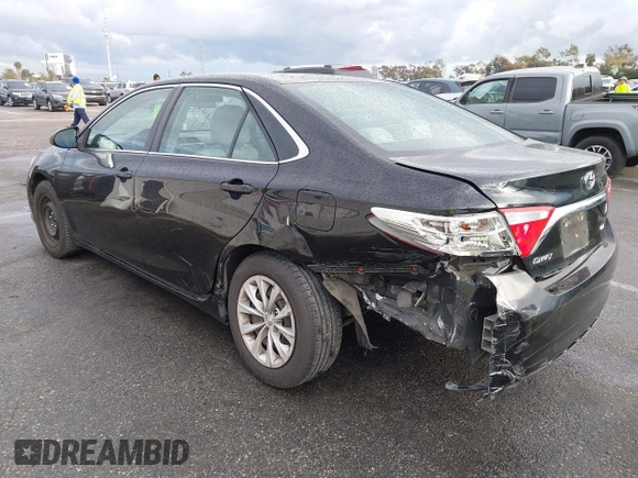 2015 Toyota Camry XLE with VIN 4T4BF1FK9FR461402, listed as a IAAI auction lot 41772628 with 92,795 mi miles and . Bid and sale history available at DreamBid. Image 3.