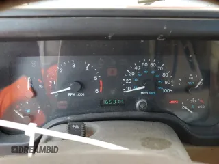 2000 Jeep Wrangler Sport with VIN 1J4FA49S0YP770943, listed as a Copart auction lot 68615524 with 165,377 mi miles and Salvage Title. Bid and sale history available at carsss.com. Image 9.