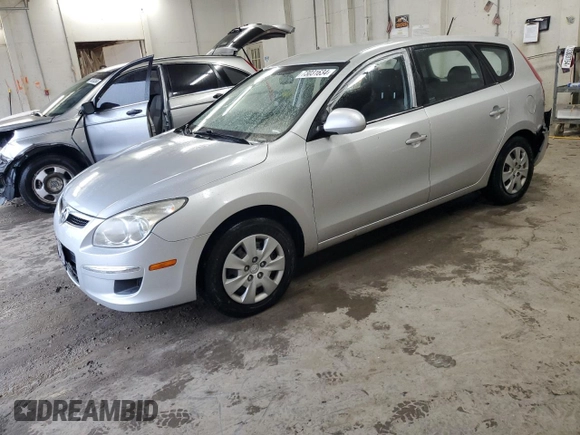 2011 Hyundai Elantra Touring GLS with VIN KMHDB8AE6BU097622, listed as a Copart auction lot 73031634 with 100,697 mi miles and Salvage Title. Bid and sale history available at carsss.com. Image 1.