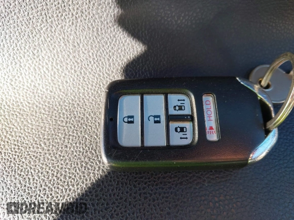 2015 Honda Odyssey EX with VIN 5FNRL5H47FB503280, listed as a IAAI auction lot 40932917 with 254,551 mi miles and . Bid and sale history available at DreamBid. Image 11.