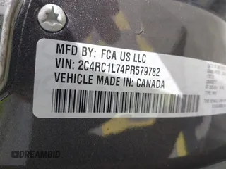 2023 Chrysler Pacifica Hybrid Touring L with VIN 2C4RC1L74PR579782, listed as a IAAI auction lot 42487390 with Not provided miles and . Bid and sale history available at DreamBid. Image 9.