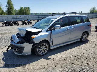 2012 Mazda 5 Touring z VIN JM1CW2CL2C0110758, wystawiony jako Copart lot #54979405 z przebiegiem 64 499 mil mil oraz Szkoda całkowita • Salvage title. Historia ofert i sprzedaży dostępna na DreamBid. Obrazek 1.