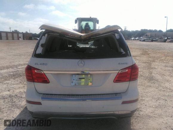 2014 Mercedes-Benz GL 450 z VIN 4JGDF7CE2EA287810, wystawiony jako IAAI lot #39696896 z przebiegiem 181 816 mil mil oraz . Historia ofert i sprzedaży dostępna na DreamBid. Obrazek 16.