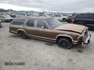 1987 Ford Crown Victoria z VIN 2FABP79F7HX228617, wystawiony jako Copart lot #82165434 z przebiegiem 99 456 mil mil oraz Szkody całkowita. Historia ofert i sprzedaży dostępna na DreamBid. Obrazek 4.