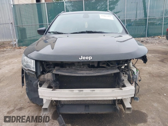 2018 Jeep Compass Latitude with VIN 3C4NJCBB7JT285996, listed as a IAAI auction lot 42063437 with 91,505 mi miles and . Bid and sale history available at DreamBid. Image 13.