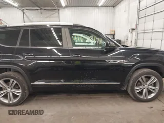 2018 Volkswagen Atlas SEL z VIN 1V2RR2CAXJC548261, wystawiony jako IAAI lot #41650478 z przebiegiem 123 399 mil mil oraz . Historia ofert i sprzedaży dostępna na DreamBid. Obrazek 14.