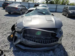 2021 Ford Mustang GT z VIN 1FA6P8CF0M5147552, wystawiony jako Copart lot #45904745 z przebiegiem Nie podano mil oraz Nie do naprawy. Historia ofert i sprzedaży dostępna na DreamBid. Obrazek 5.