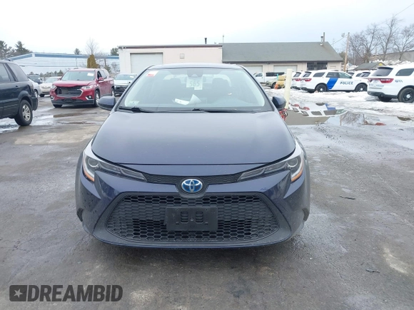 2021 Toyota Corolla Hybrid LE with VIN JTDEAMDE2MJ030035, listed as a IAAI auction lot 41644662 with 130,693 mi miles. Bid and sale history available at carsss.com. Image 12.