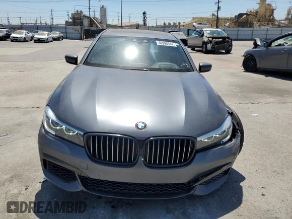 2018 BMW 7 Series 740i with VIN WBA7E2C59JG742809, listed as a Copart auction lot 66995934 with 62,017 mi miles and Salvage Title. Bid and sale history available at carsss.com. Image 5.