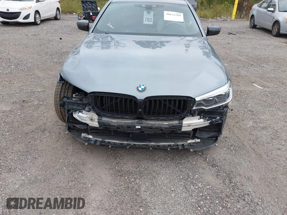 2019 BMW 5 Series M550i xDrive with VIN WBAJB9C57KB289439, listed as a IAAI auction lot 40634389 with 85,992 mi miles and . Bid and sale history available at DreamBid. Image 13.