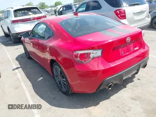 2015 Scion FR-S with VIN JF1ZNAA15F8708315, listed as a IAAI auction lot 41961534 with 102,640 mi miles. Bid and sale history available at carsss.com. Image 3.