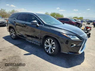2019 Lexus RX 350L Premium with VIN JTJDZKCA4K2019484, listed as a Copart auction lot 60452455 with 66,007 mi miles and Salvage title. Bid and sale history available at DreamBid. Image 4.