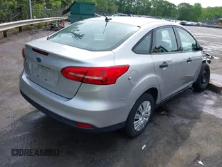 2017 Ford Focus S z VIN 1FADP3E21HL241557, wystawiony jako IAAI lot #42100036 z przebiegiem 106 764 mil mil oraz . Historia ofert i sprzedaży dostępna na DreamBid. Obrazek 4.