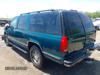1997 GMC Suburban with VIN 3GKFK16R5VG508908, listed as a IAAI auction lot 42103068 with 264,446 mi miles and . Bid and sale history available at DreamBid. Image 3.