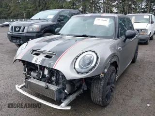 2017 MINI Hardtop 4 Door Cooper S z VIN WMWXU3C58H2D33073, wystawiony jako IAAI lot #41913081 z przebiegiem 51 631 mil mil oraz . Historia ofert i sprzedaży dostępna na DreamBid. Obrazek 2.