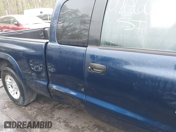 2002 Dodge Dakota Sport with VIN 1B7GL32X12S561414, listed as a IAAI auction lot 42060300 with 235,957 mi miles. Bid and sale history available at carsss.com. Image 6.