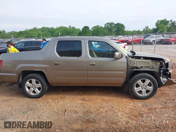 2010 Honda Ridgeline RTL with VIN 5FPYK1F50AB003576, listed as a IAAI auction lot 42050763 with 183,197 mi miles. Bid and sale history available at carsss.com. Image 13.