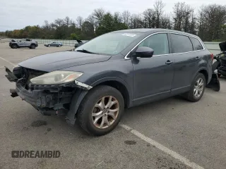 2014 Mazda CX-9 Touring with VIN JM3TB3CV1E0438847, listed as a Copart auction lot 62277205 with 209,050 mi miles and Salvage title. Bid and sale history available at DreamBid. Image 1.
