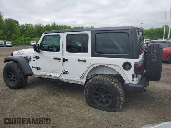 2022 Jeep Wrangler Unlimited Sport S with VIN 1C4HJXDG4NW235781, listed as a Copart auction lot 57184895 with 30,883 mi miles and Salvage title. Bid and sale history available at DreamBid. Image 2.