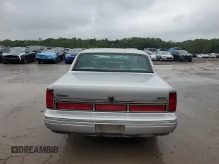 1997 Lincoln Town Car Executive z VIN 1LNLM81W1VY719314, wystawiony jako Copart lot #73950324 z przebiegiem Nie podano mil oraz Szkody całkowita. Historia ofert i sprzedaży dostępna na DreamBid. Obrazek 6.
