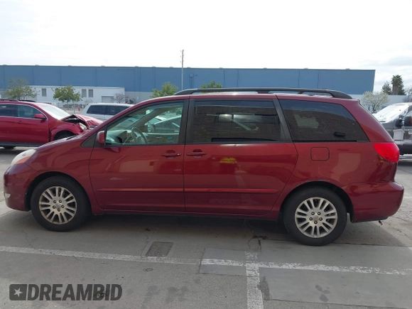 2009 Toyota Sienna XLE with VIN 5TDZK22C29S261516, listed as a IAAI auction lot 41831006 with 147,667 mi miles. Bid and sale history available at carsss.com. Image 14.