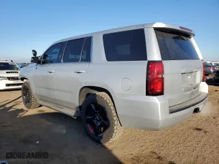 2015 Chevrolet Tahoe Commercial with VIN 1GNSK2EC9FR652628, listed as a Copart auction lot 82393714 with 122,001 mi miles and Salvage Title. Bid and sale history available at carsss.com. Image 2.