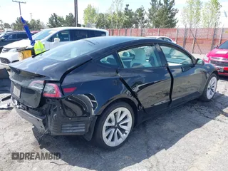 2022 Tesla Model 3 with VIN 5YJ3E1EA4NF316127, listed as a IAAI auction lot 41939191 with 30,857 mi miles. Bid and sale history available at carsss.com. Image 4.