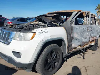 2011 Jeep Grand Cherokee Laredo with VIN 1J4RS4GG2BC618072, listed as a IAAI auction lot 38619850 with Not Provided miles and . Bid and sale history available at DreamBid. Image 6.