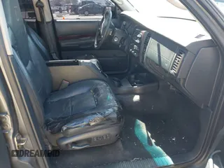 2001 Dodge Durango z VIN 1B4HR28Z11F613523, wystawiony jako IAAI lot #41703743 z przebiegiem 142 828 mil mil oraz . Historia ofert i sprzedaży dostępna na DreamBid. Obrazek 5.