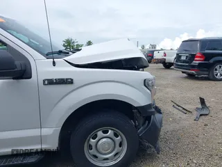 2018 Ford F-150 XL z VIN 1FTFX1E59JKE52129, wystawiony jako IAAI lot #42233231 z przebiegiem 97 262 mil mil oraz . Historia ofert i sprzedaży dostępna na DreamBid. Obrazek 21.