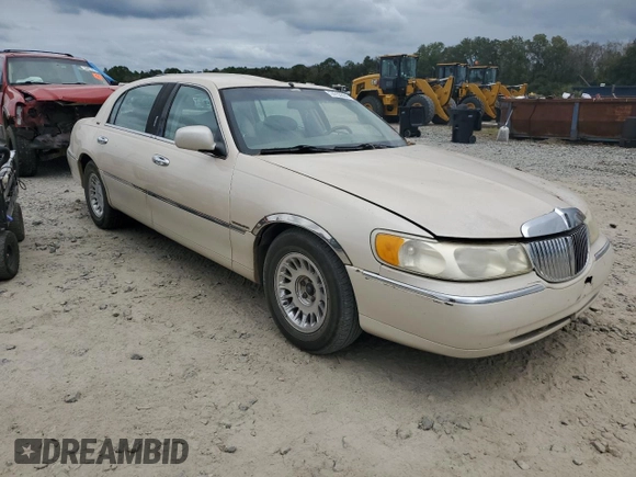 2001 Lincoln Town Car Cartier L z VIN 1LNHM85W61Y640344, wystawiony jako Copart lot #74755564 z przebiegiem Nie podano mil oraz Szkoda całkowita • Salvage title. Historia ofert i sprzedaży dostępna na DreamBid. Obrazek 4.