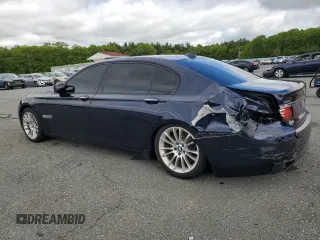 2014 BMW 7 Series ALPINA B7 xDrive with VIN WBAYF8C58ED142004, listed as a Copart auction lot 57994895 with 134,841 mi miles and Salvage title. Bid and sale history available at DreamBid. Image 2.