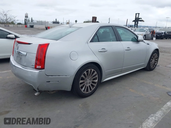 2013 Cadillac CTS Performance with VIN 1G6DJ5E32D0175793, listed as a IAAI auction lot 41885572 with 109,243 mi miles and . Bid and sale history available at DreamBid. Image 4.