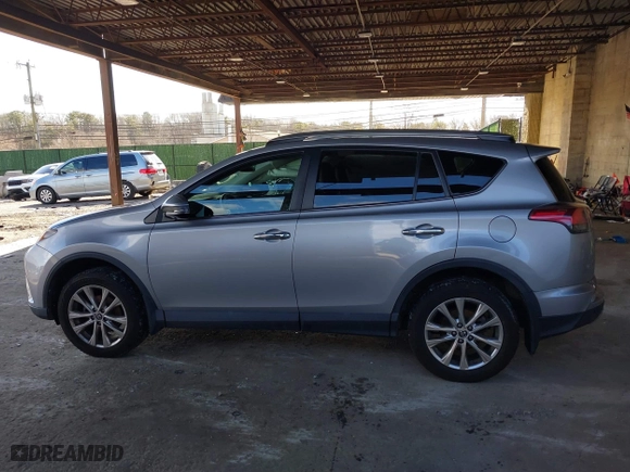 2018 Toyota RAV4 Limited with VIN 2T3DFREV4JW709049, listed as a IAAI auction lot 41596609 with 50,860 mi miles. Bid and sale history available at carsss.com. Image 14.