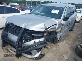 2023 Dodge Durango Pursuit with VIN 1C4SDJFT5PC629959, listed as a IAAI auction lot 40274866 with 6,877 mi miles and . Bid and sale history available at DreamBid. Image 6.
