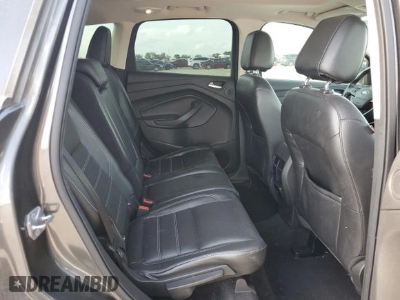 2017 Ford Escape SE with VIN 1FMCU0GD7HUD93215, listed as a Copart auction lot 54966295 with 153,704 mi miles and Salvage Title. Bid and sale history available at DreamBid. Image 11.