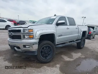 2015 Chevrolet Silverado 1500 LT with VIN 3GCUKREC8FG490856, listed as a IAAI auction lot 42067589 with 121,120 mi miles. Bid and sale history available at carsss.com. Image 14.
