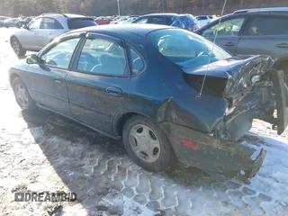 1998 Ford Taurus LX z VIN 1FAFP52U6WA109509, wystawiony jako IAAI lot #41420178 z przebiegiem 287 791 mil mil oraz . Historia ofert i sprzedaży dostępna na DreamBid. Obrazek 3.