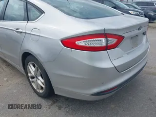 2016 Ford Fusion SE z VIN 3FA6P0H72GR296906, wystawiony jako IAAI lot #42571597 z przebiegiem 242 623 mil mil oraz . Historia ofert i sprzedaży dostępna na DreamBid. Obrazek 6.