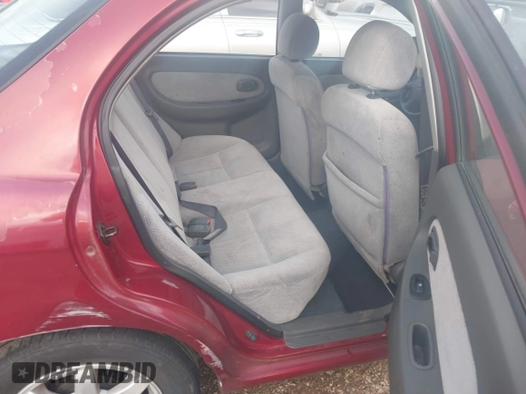 2003 Kia Spectra z VIN KNAFB121X35293054, wystawiony jako IAAI lot #42274932 z przebiegiem 108 978 mil mil oraz . Historia ofert i sprzedaży dostępna na DreamBid. Obrazek 8.