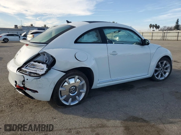 2019 Volkswagen Beetle SE with VIN 3VWJD7AT9KM720369, listed as a Copart auction lot 43407005 with Not provided miles and Salvage title. Bid and sale history available at DreamBid. Image 3.