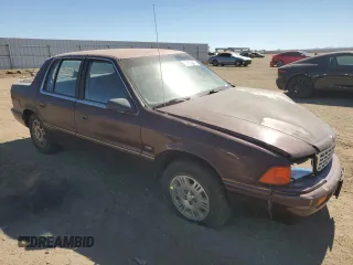 1993 Plymouth Acclaim z VIN 1P3XA4630PF630239, wystawiony jako Copart lot #75910954 z przebiegiem 87 471 mil mil oraz Tytuł czysty. Historia ofert i sprzedaży dostępna na DreamBid. Obrazek 4.