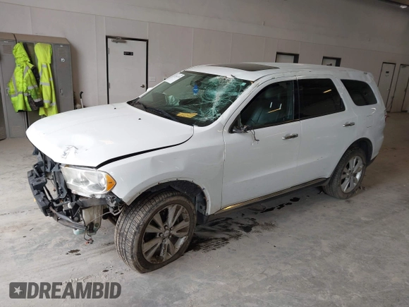 2013 Dodge Durango Crew z VIN 1C4SDJDT3DC540700, wystawiony jako IAAI lot #42097270 z przebiegiem 197 195 mil mil oraz . Historia ofert i sprzedaży dostępna na DreamBid. Obrazek 2.