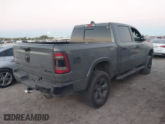 2020 Ram 1500 Big Horn with VIN 1C6SRFFT0LN380054, listed as a IAAI auction lot 41082003 with 112,434 mi miles and . Bid and sale history available at DreamBid. Image 4.