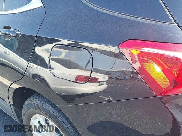 2019 Chevrolet Equinox LT z VIN 2GNAXTEV0K6261541, wystawiony jako IAAI lot #42501081 z przebiegiem 68 375 mil mil oraz . Historia ofert i sprzedaży dostępna na DreamBid. Obrazek 1.