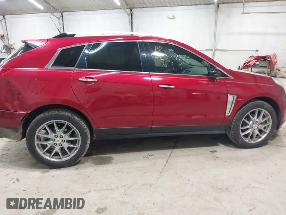 2014 Cadillac SRX Performance Collection z VIN 3GYFNCE30ES596415, wystawiony jako IAAI lot #42329771 z przebiegiem 71 620 mil mil oraz . Historia ofert i sprzedaży dostępna na DreamBid. Obrazek 13.