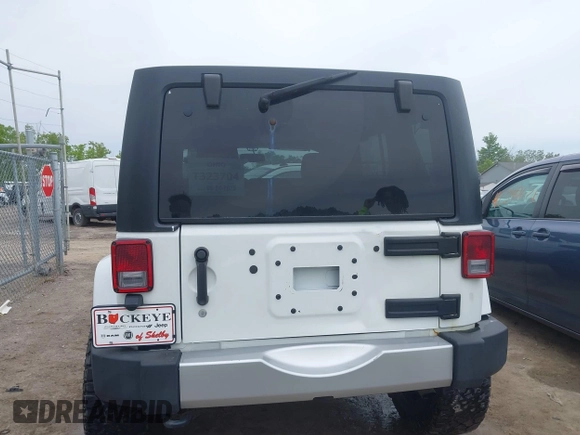2015 Jeep Wrangler Unlimited Sahara с VIN 1C4BJWEG1FL506393, выставлен на аукционе IAAI как лот 42326900 с пробегом 100 538 миль миль и . История ставок и продаж доступна на DreamBid. Изображение 16.