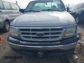 1999 Ford F-150 with VIN 1FTZF1726XNB02953, listed as a IAAI auction lot 41565566 with 180,775 mi miles and . Bid and sale history available at DreamBid. Image 12.