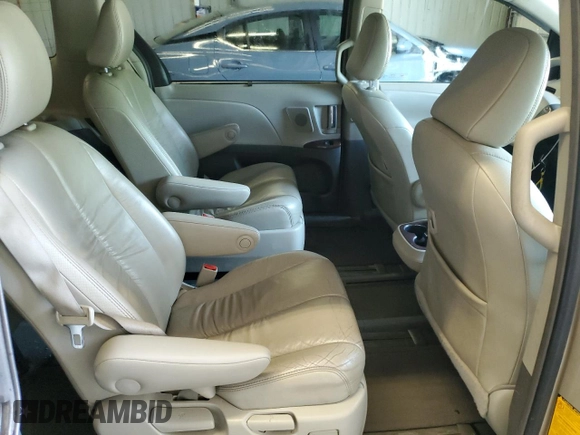 2011 Toyota Sienna XLE with VIN 5TDDK3DC7BS009764, listed as a Copart auction lot 59179775 with 197,145 mi miles and Salvage title. Bid and sale history available at DreamBid. Image 11.